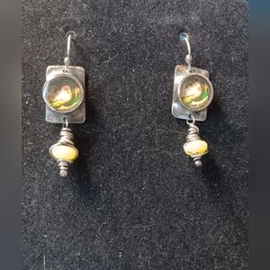 Elegant Silver Tone And Yellow Earrings Featuring A Bird In Circle